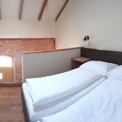 Maison am Liesingbach Appartements Schlafbereich mir Galerie